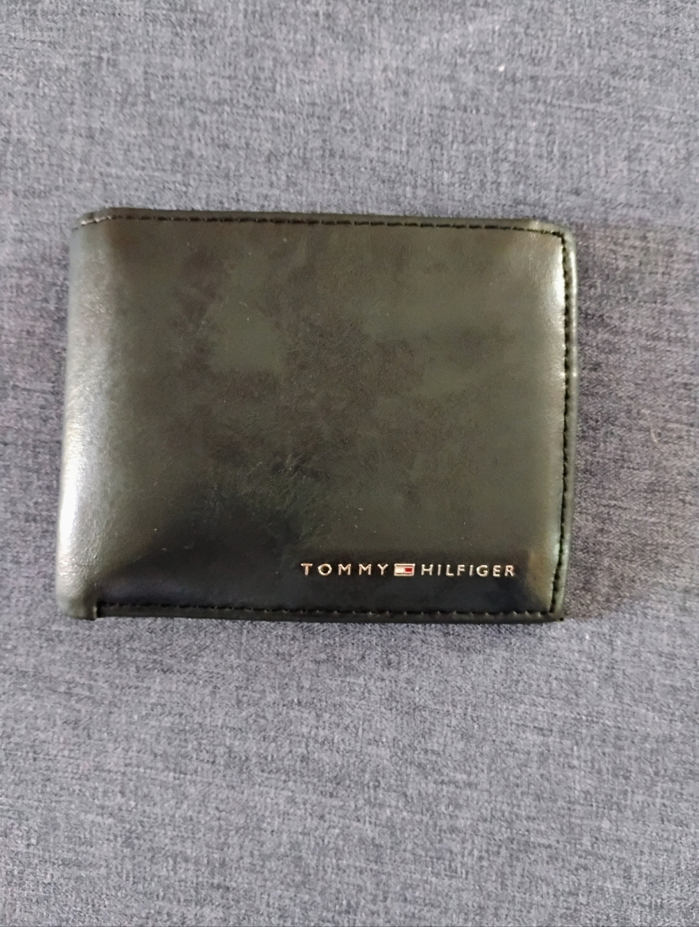 Tommy Hilfiger Black Leather Bi-Fold Wallet with Gold Logo
